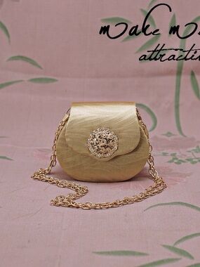 Gold Satin Mini Crossbody Bag with Decorative Medallion